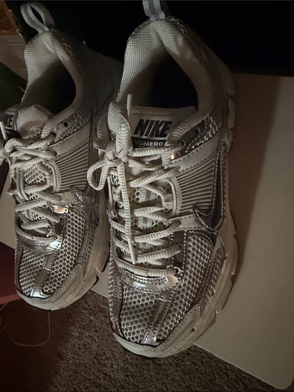 Nike Women’s Silver and White Sneakers